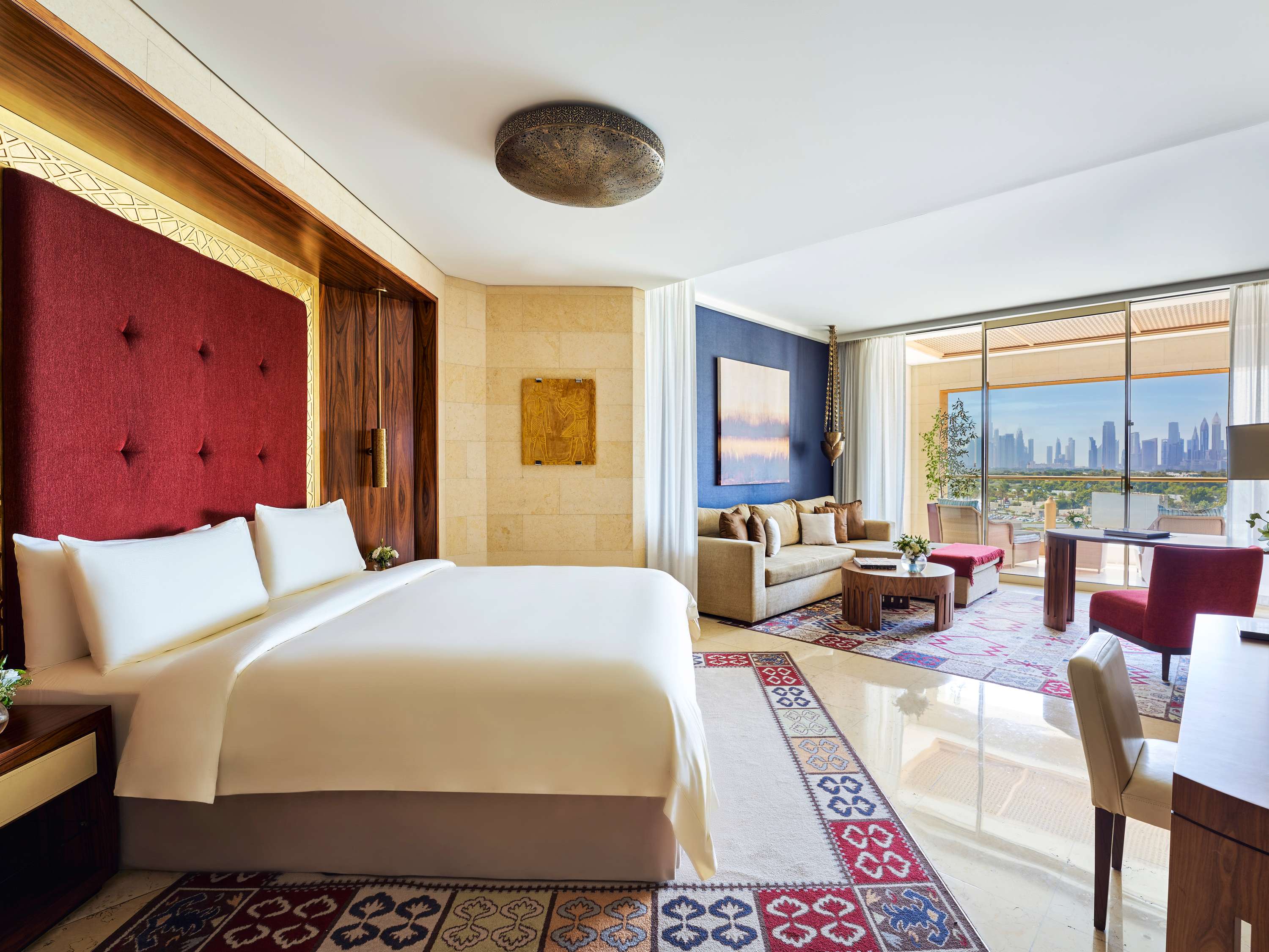 Luxurious Signature Room King at Raffles Dubai with private balcony and elegant Middle Eastern-Asian fusion design