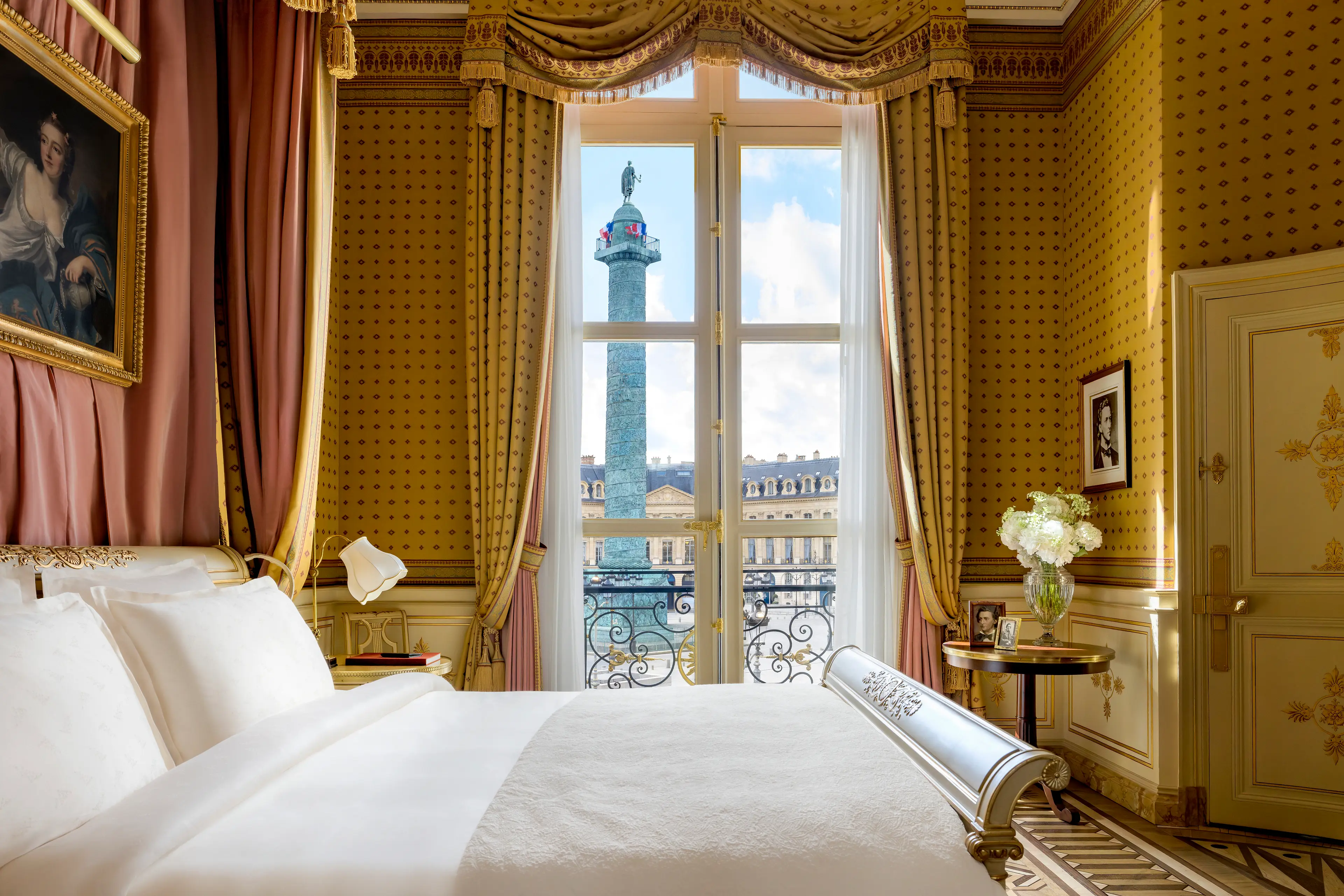 Suite Chopin at Ritz Paris featuring a grand piano and views of Vendôme Square
