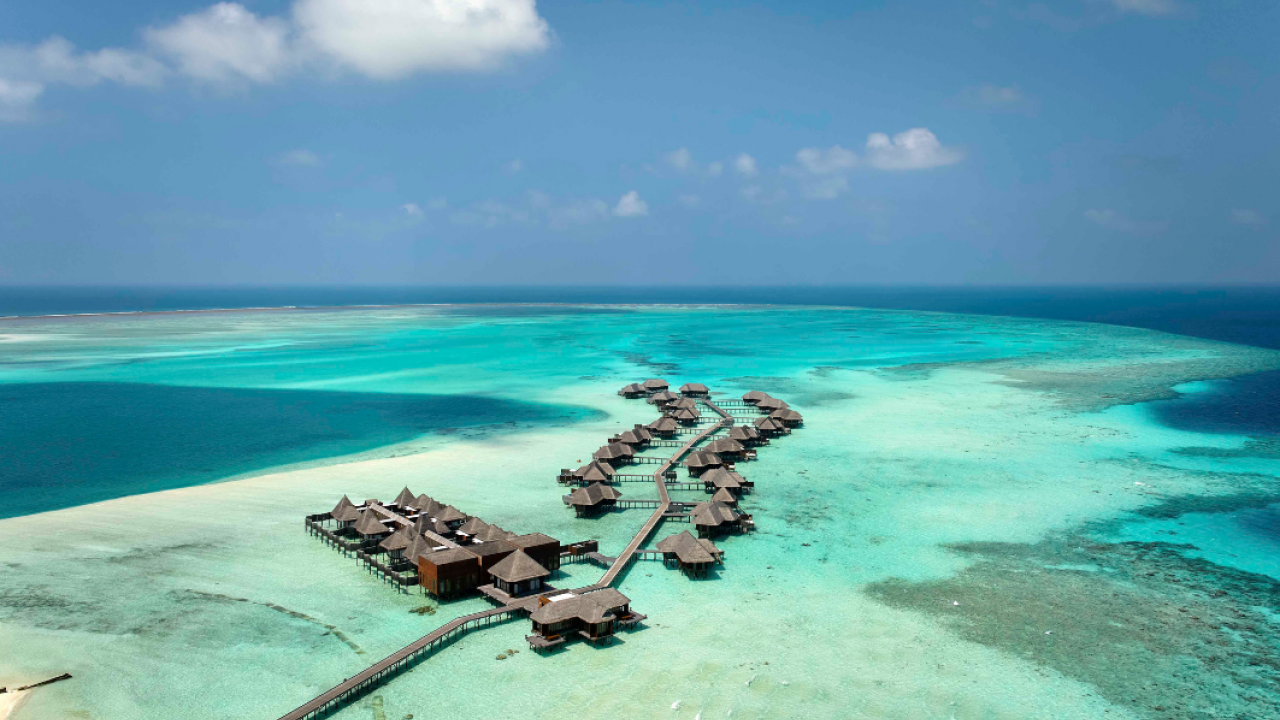 Aerial view of Grand Water Villas and Over-Water Spa at Conrad Maldives.
