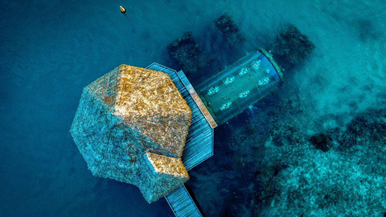 Aerial top-down view of Ithaa Undersea Restaurant at Conrad Maldives.