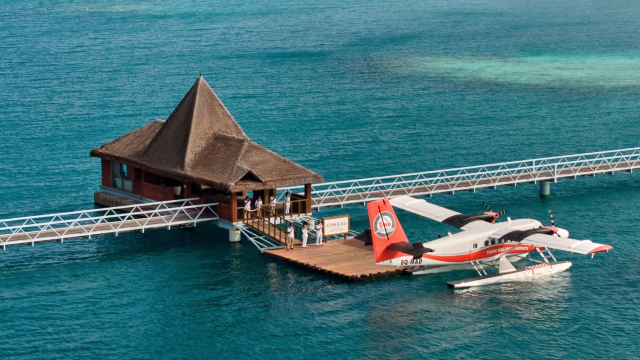 Seaplane arrival and welcome at Conrad Maldives Rangali Island.