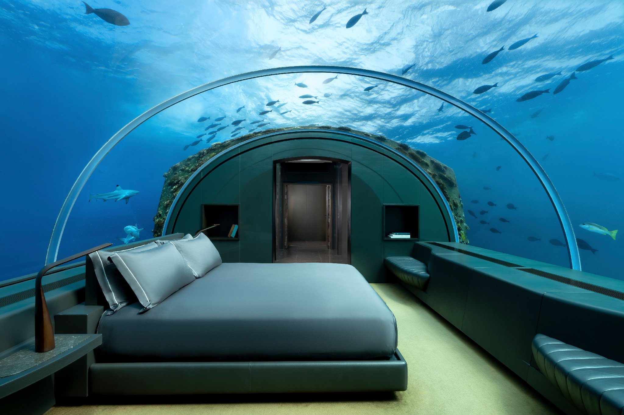 The Muraka's undersea master bedroom with 180-degree ocean views at Conrad Maldives.