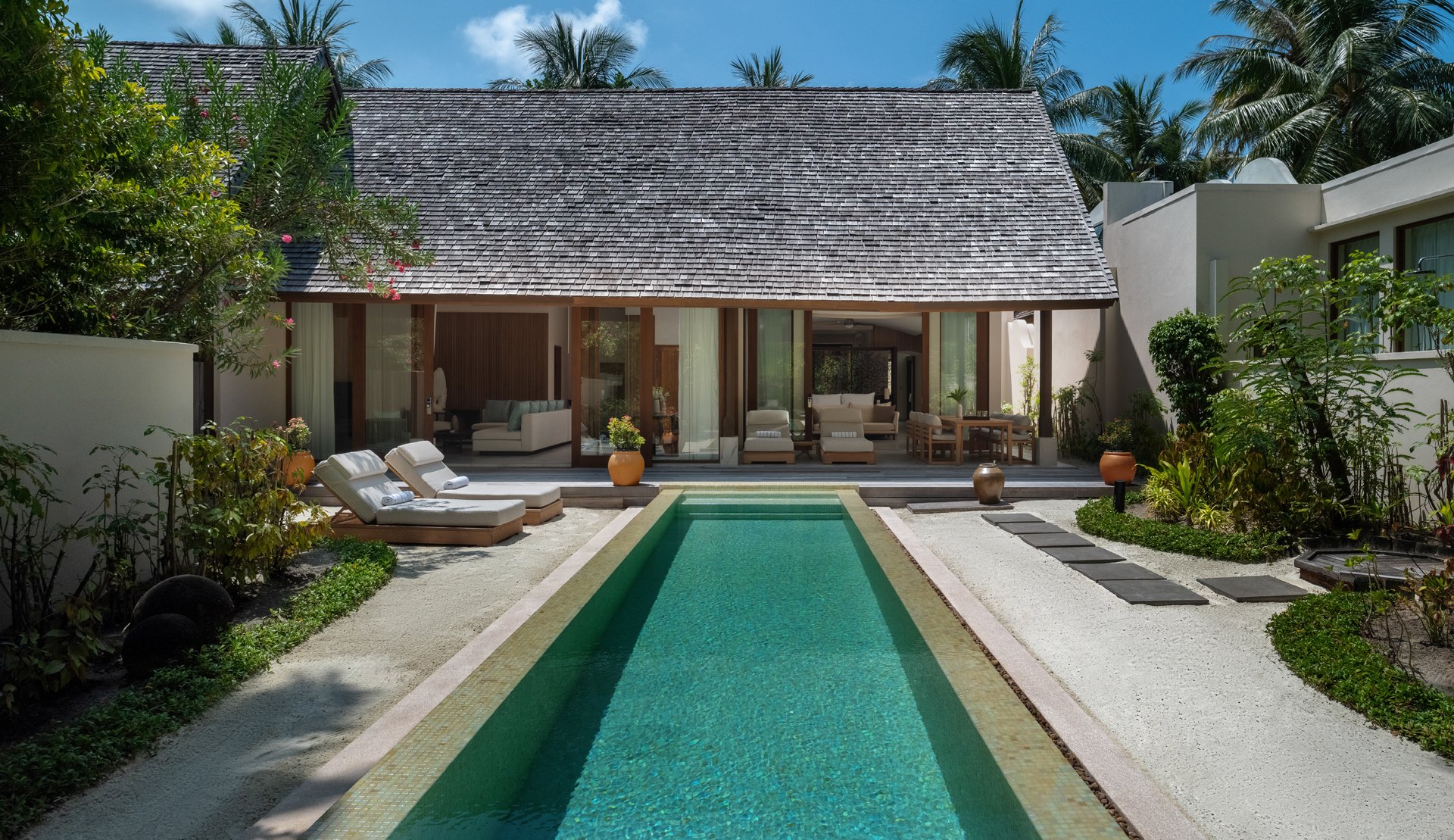Exterior view of a Three Bedroom Beach Suite with private pool at Conrad Maldives.