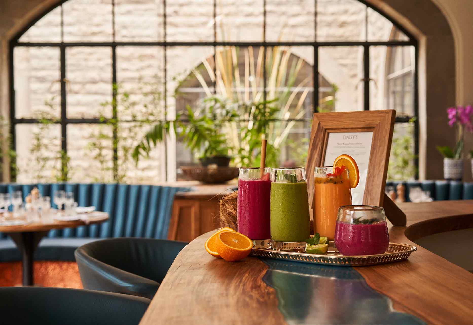 Fresh, seasonal dishes and drinks served al fresco at Daisy's Cafe within The Retreat at Giraffe Manor, Nairobi.