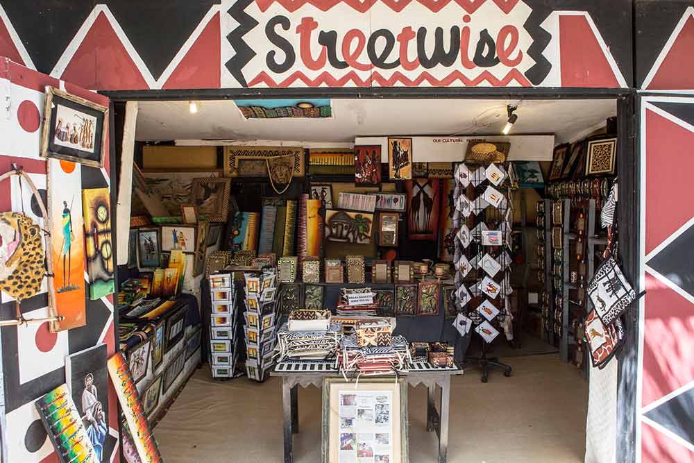 Browsing for unique Kenyan souvenirs and handicrafts at the Streetwise gift shop, a local boutique near Giraffe Manor in Nairobi's Karen suburb.