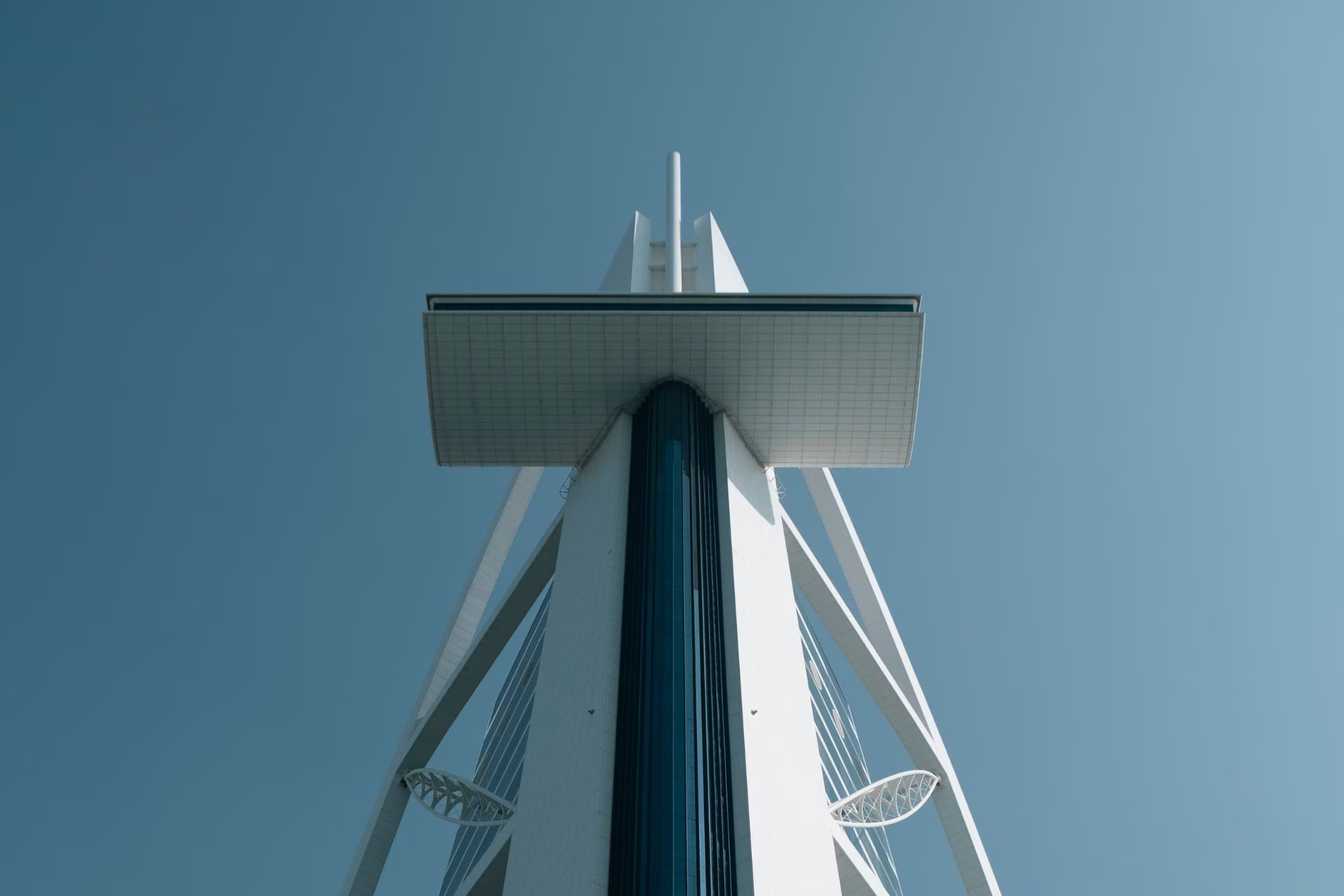 A close-up view of the stunning architectural details of the Jumeirah Burj Al Arab exterior.