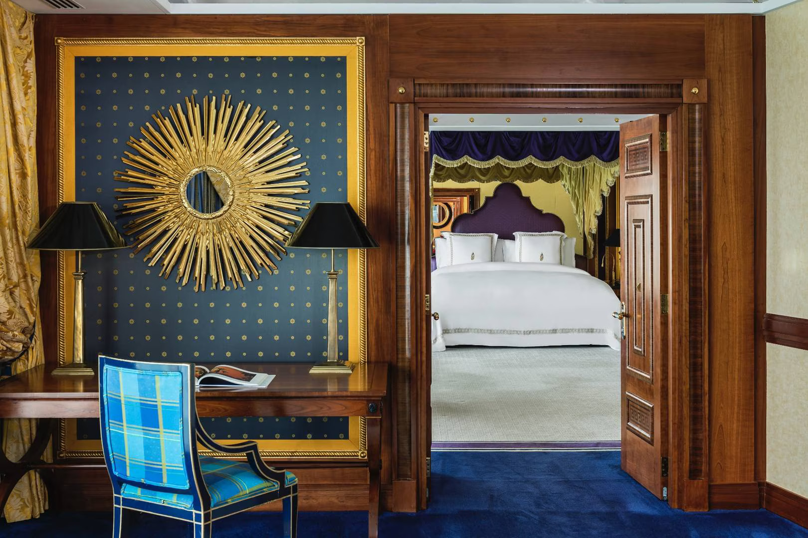 The serene and spacious bedroom of a Duplex Family Suite, designed for comfort at Burj Al Arab.