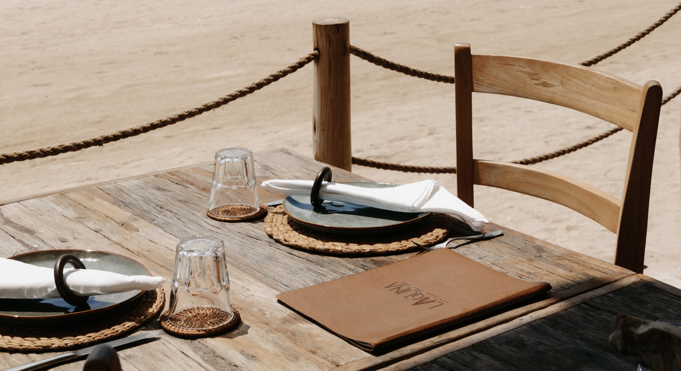 A beautifully set table at the beachfront Laguna Beach Taverna restaurant.