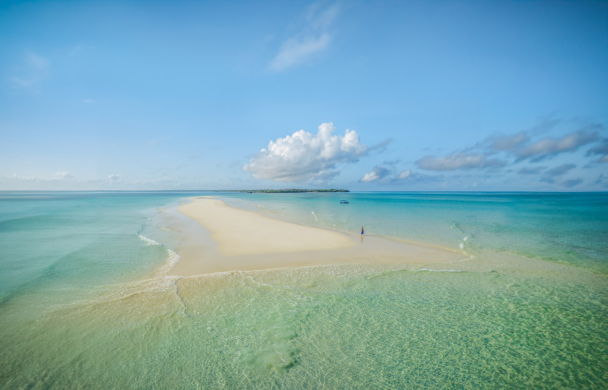 The remote sandbank visited on excursions from The Manta Resort, featuring pure white sand surrounded by turquoise water.
