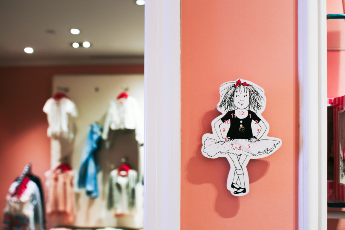 Eloise merchandise section in The Plaza Boutique, featuring books, dolls, and gifts for all ages.