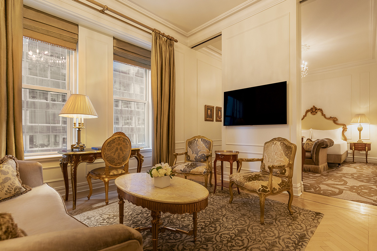 The living area in a Junior Suite King, featuring a partition for privacy and modern comforts.