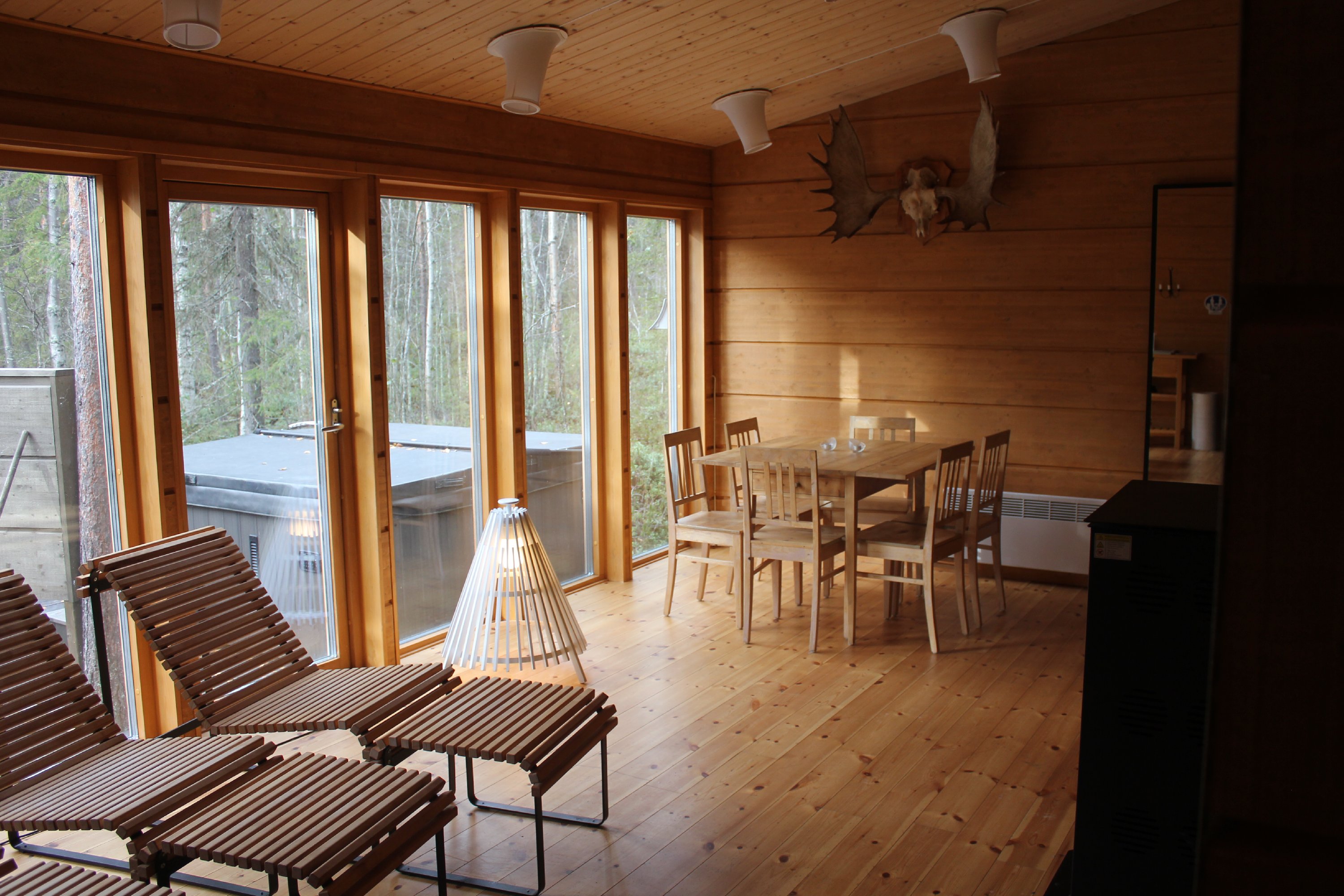 Wooden interior of the Forest SPA sauna at Treehotel, a relaxing retreat in nature.