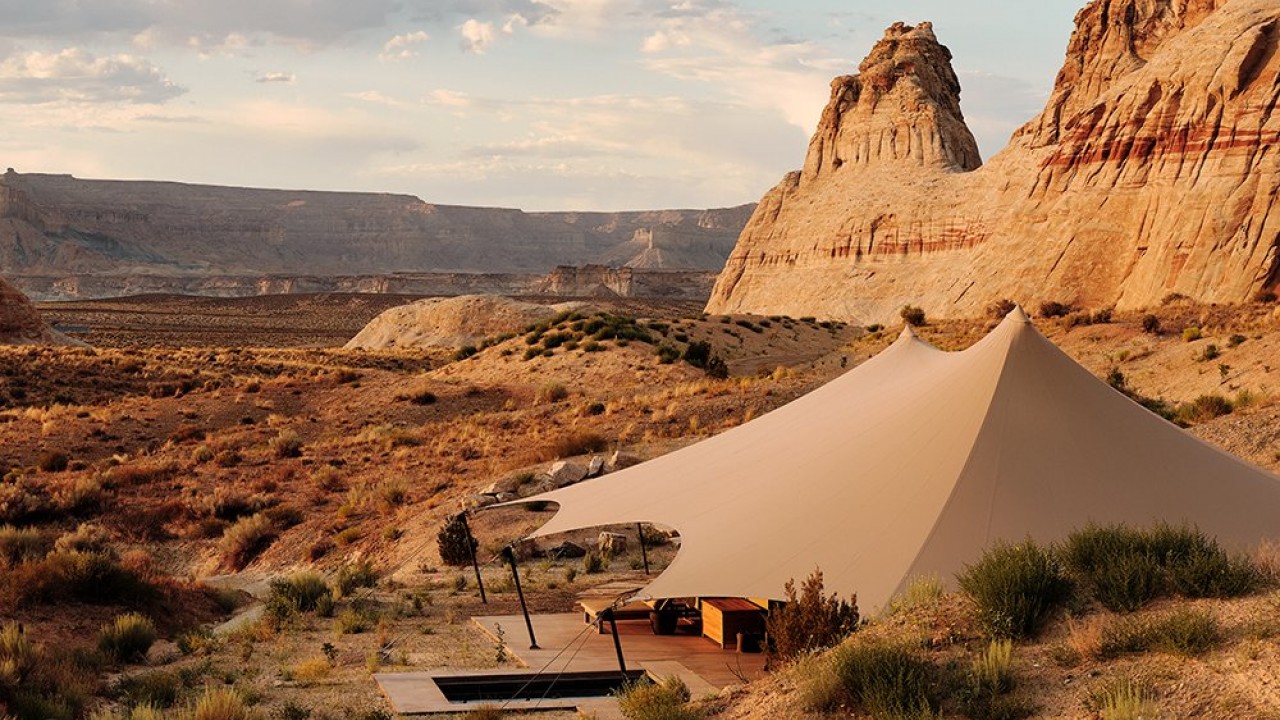 The luxury tented pavilions of Camp Sarika at Amangiri, nestled at the foot of the desert mesas.
