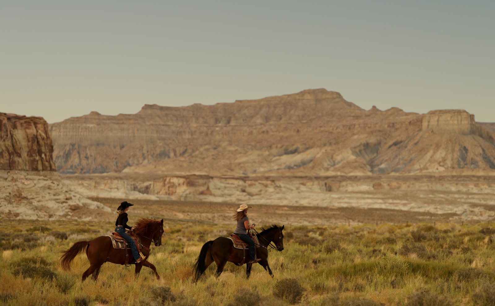 Guests enjoying a guided horseback riding experience on the trails surrounding Amangiri.