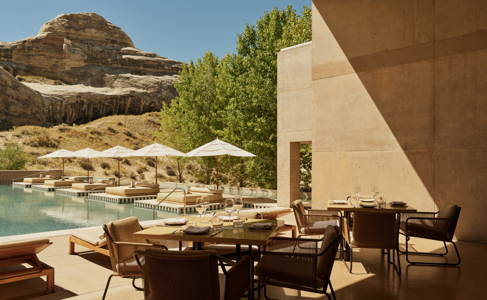 Al fresco dining on the pool terrace at Amangiri, overlooking the main swimming pool.