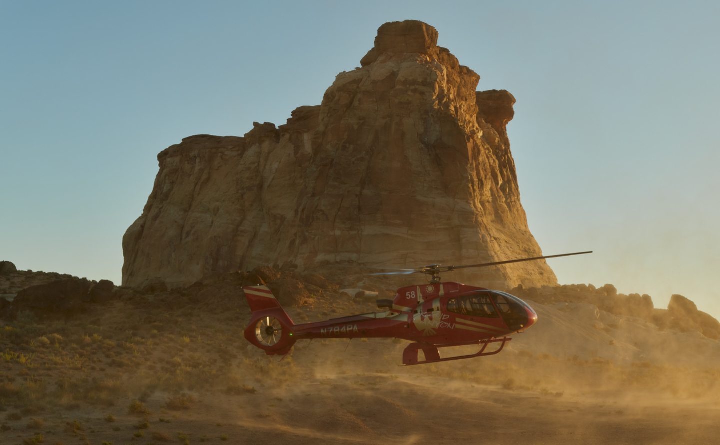 A private helicopter ready for departure on a scenic tour from Amangiri.