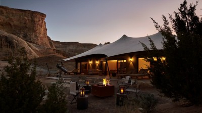 The exterior of a Two-Bedroom Grand View Tented Pavilion at Camp Sarika at sunset.