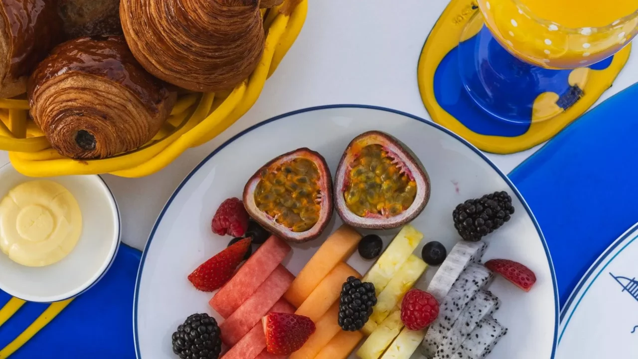 A lavish breakfast spread with pastries and fresh juices at Bab Al Yam.