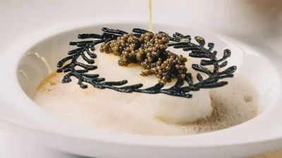 An elegantly presented gourmet dish at the stylish Gilt bar.