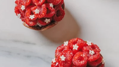 An elegant fruit and cream-based pastry, showcasing modern techniques.