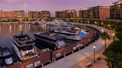 The 46-berth marina at Bvlgari Resort Dubai, designed like a Mediterranean village at dusk.