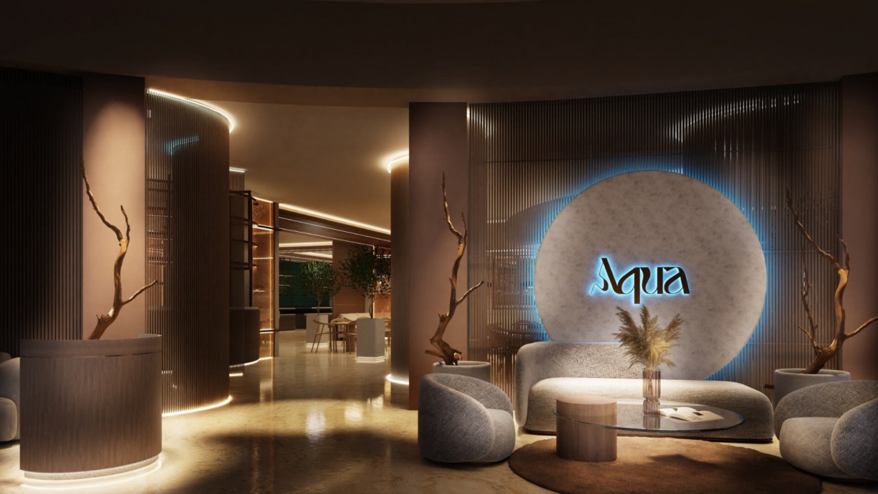 The sophisticated and modern interior of Aqua Restaurant & Bar at JA Ocean View Hotel.