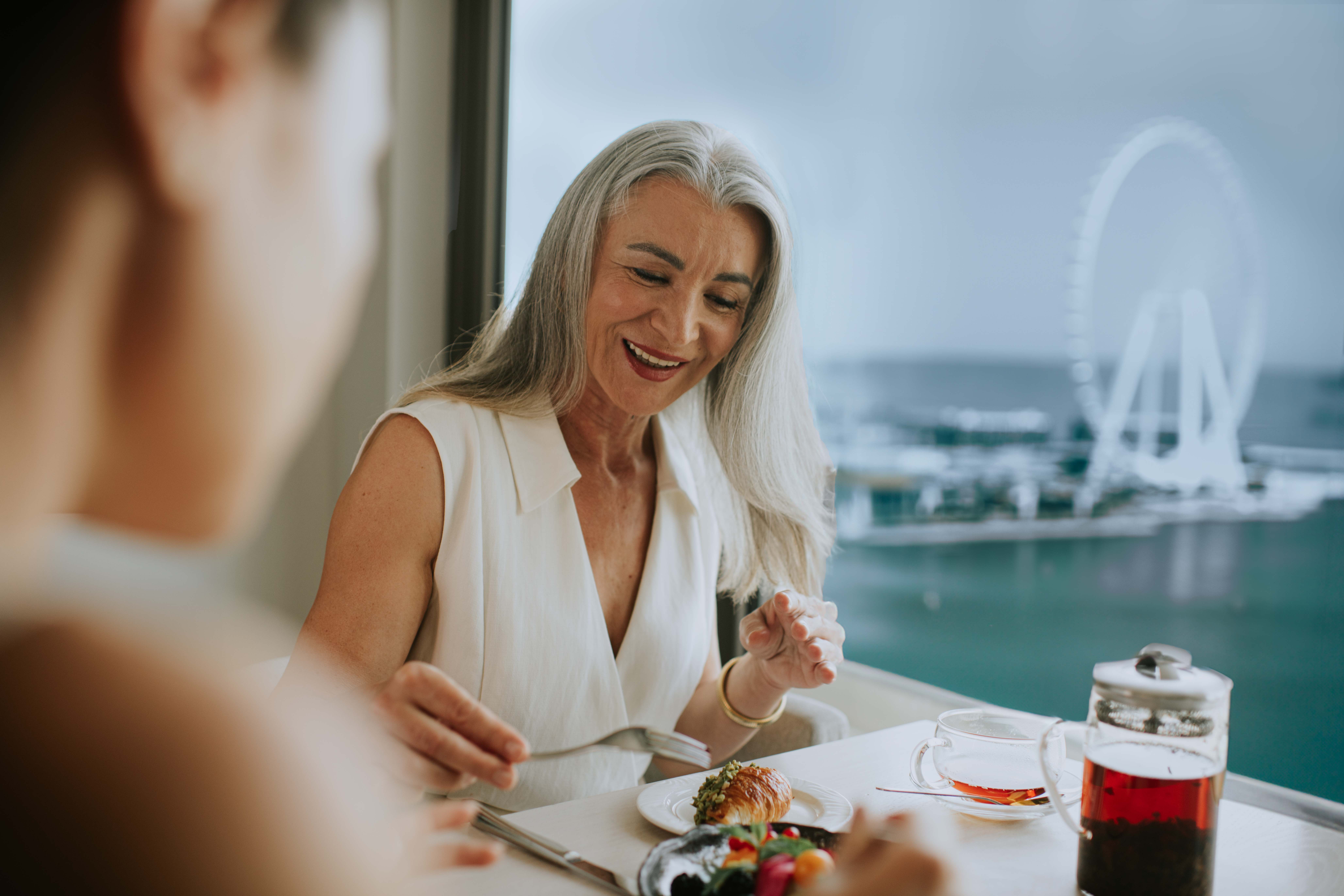 The exclusive Coral Lounge offering premium seating with a view of Ain Dubai.