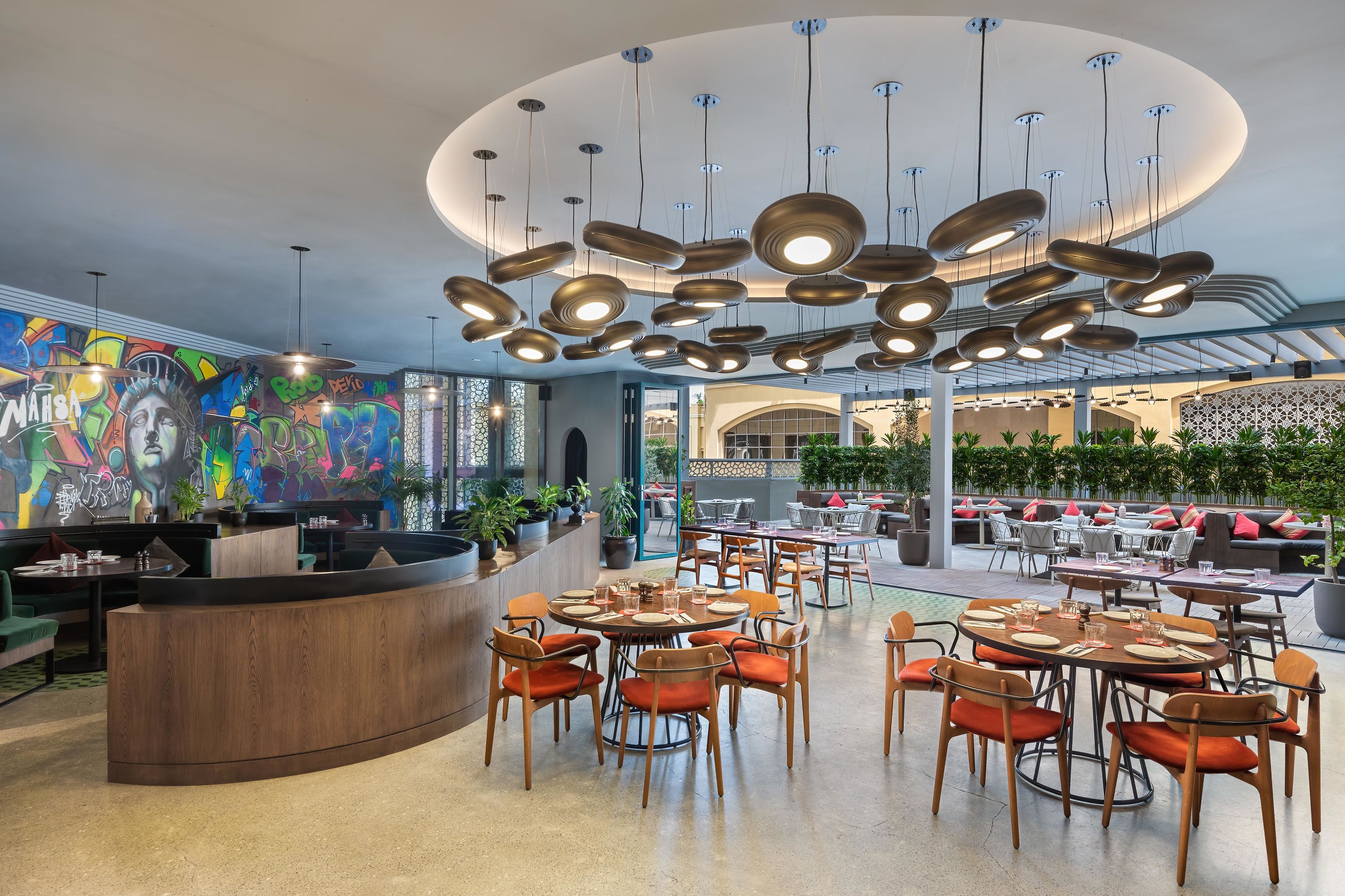 The spacious and family-friendly dining area inside IL Motto Pizzeria.