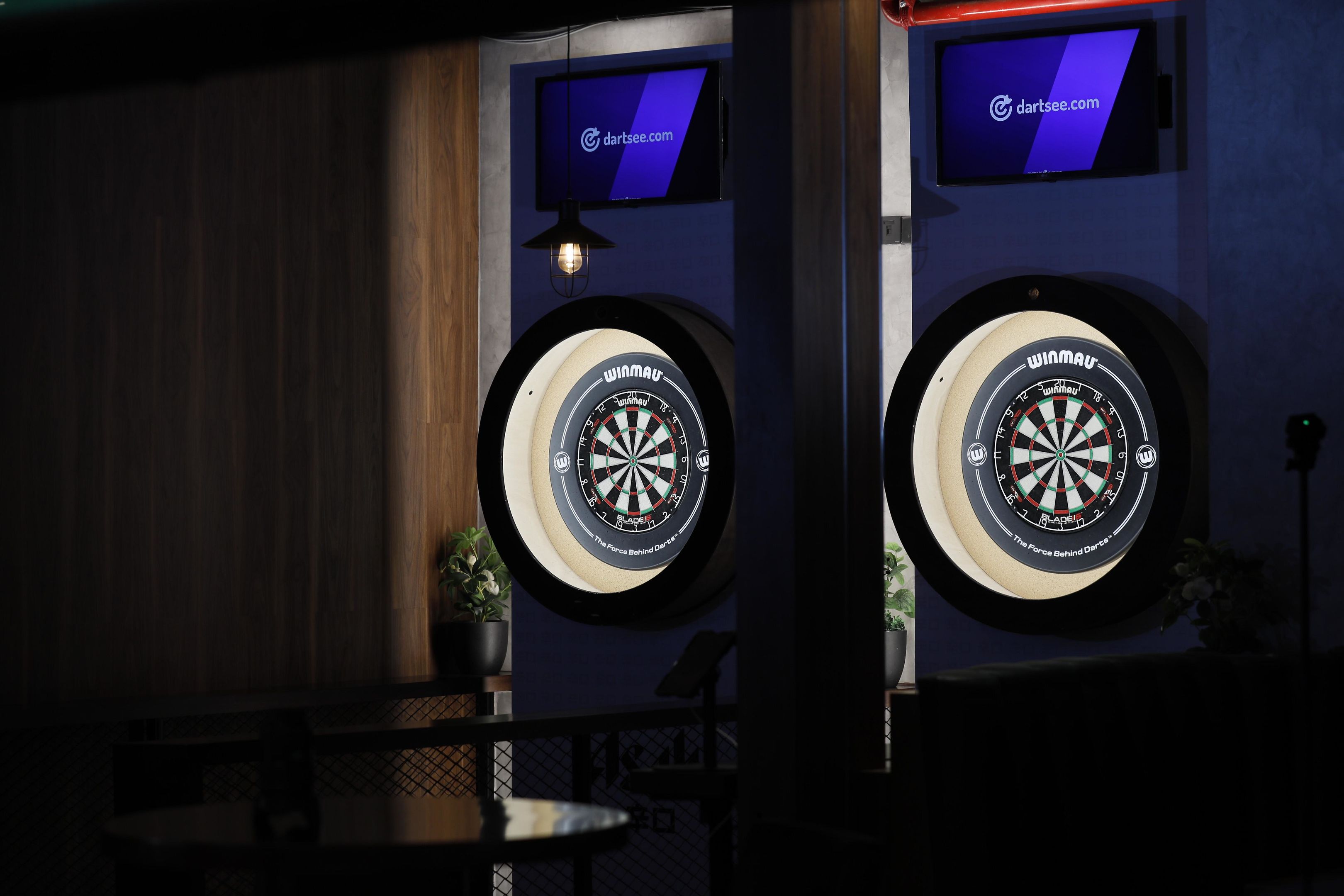 A detailed view of the well-stocked bar counter at Offside sports bar.