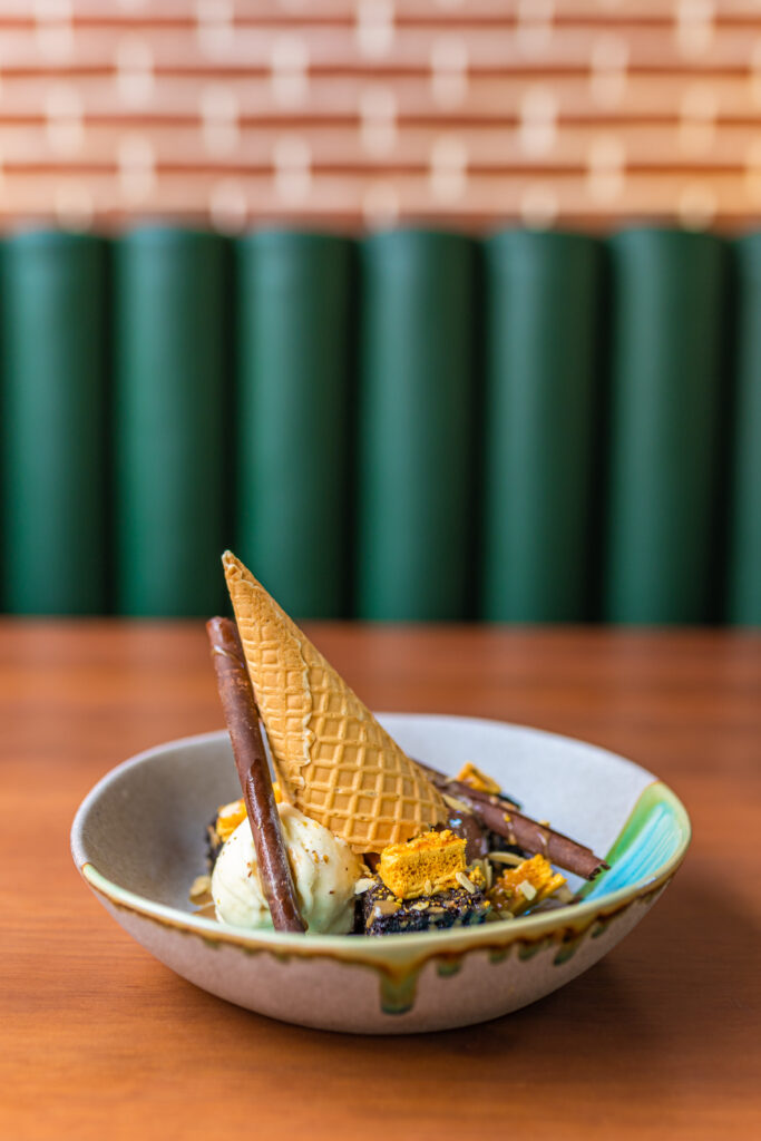 The decadent warm chocolate brownie dessert served at Offside sports bar.