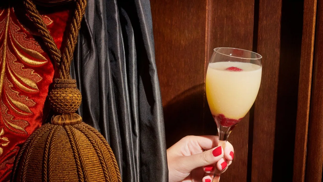 A masterfully crafted cocktail at Bar 228, where mixology is treated as a serious yet pleasurable art.