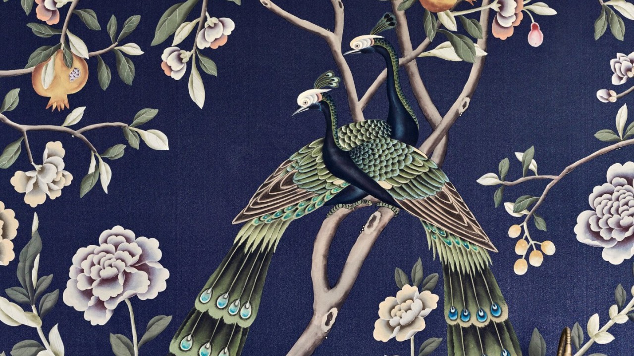 The elegant wall design and soft lighting in an Executive Room with balcony access.