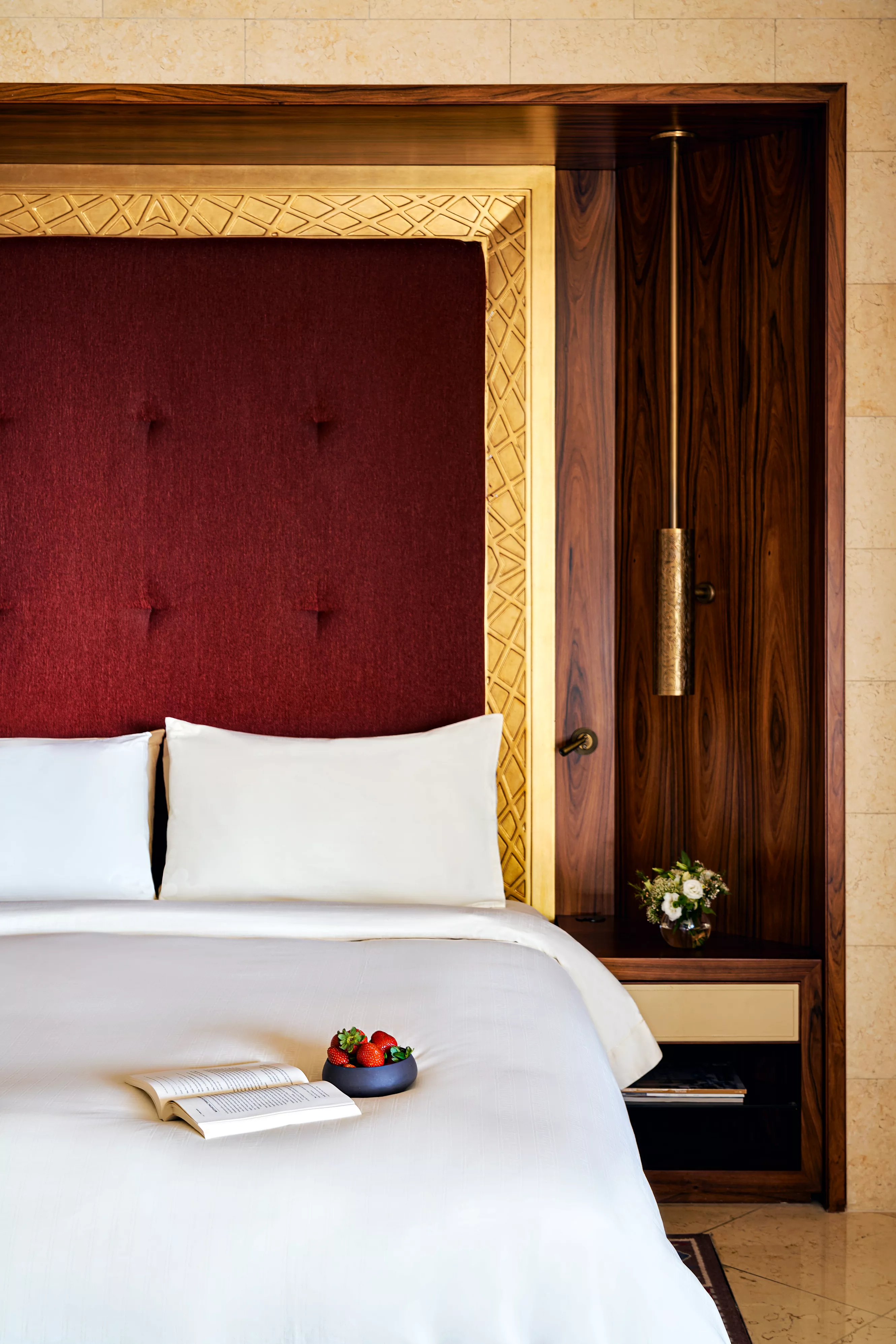 The spacious and luxurious bedroom of a Raffles Club King room, offering ultimate comfort.