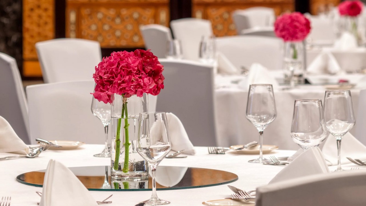 An elegant close-up of a wedding table setting, showcasing attention to detail for special occasions.