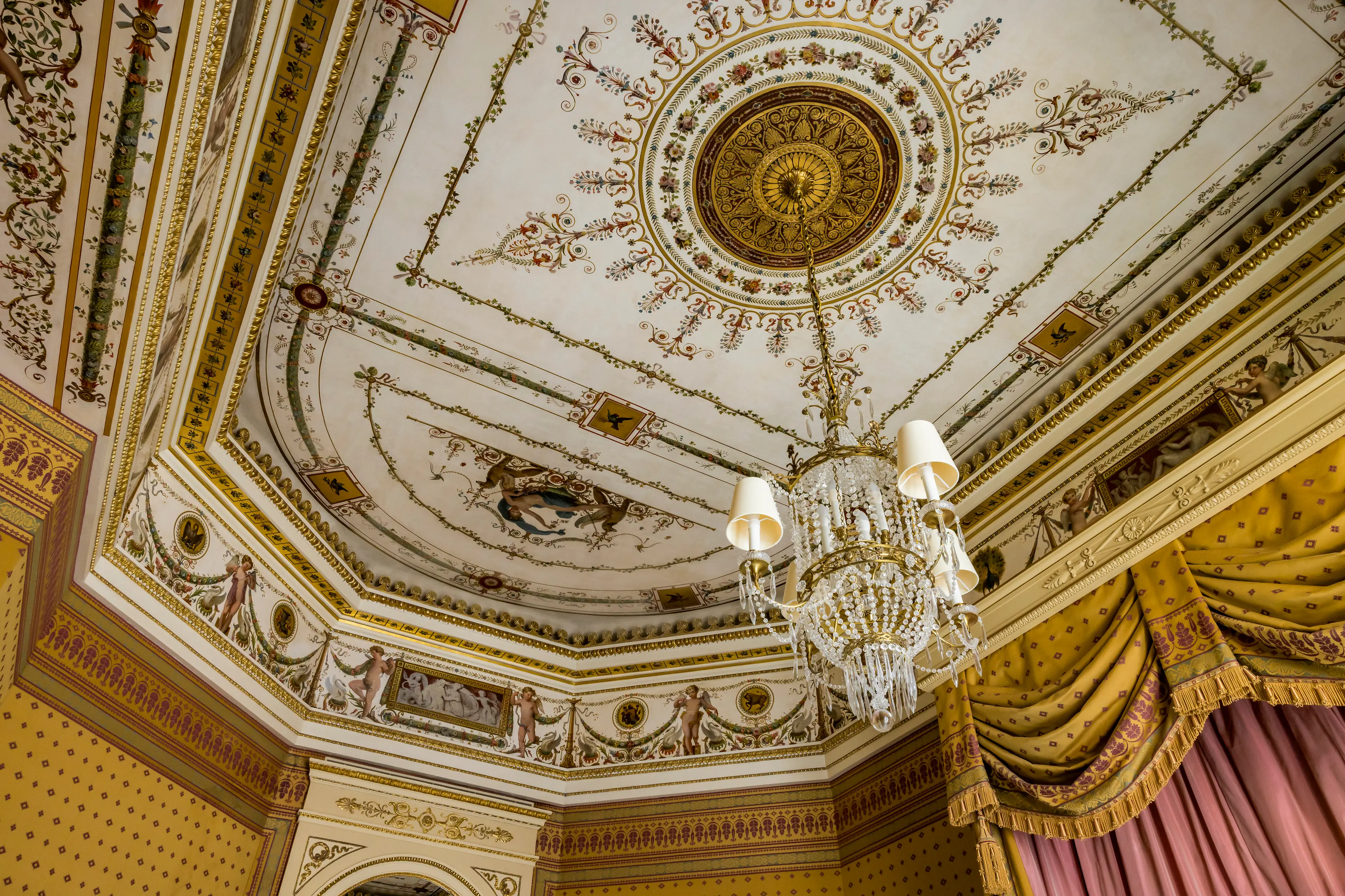 A magnificent crystal chandelier illuminating the elegant Chopin Suite.