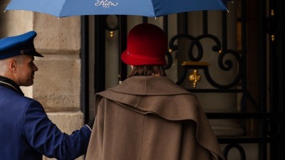 A guest receives a quintessential Parisian welcome upon arrival at the Ritz Paris.