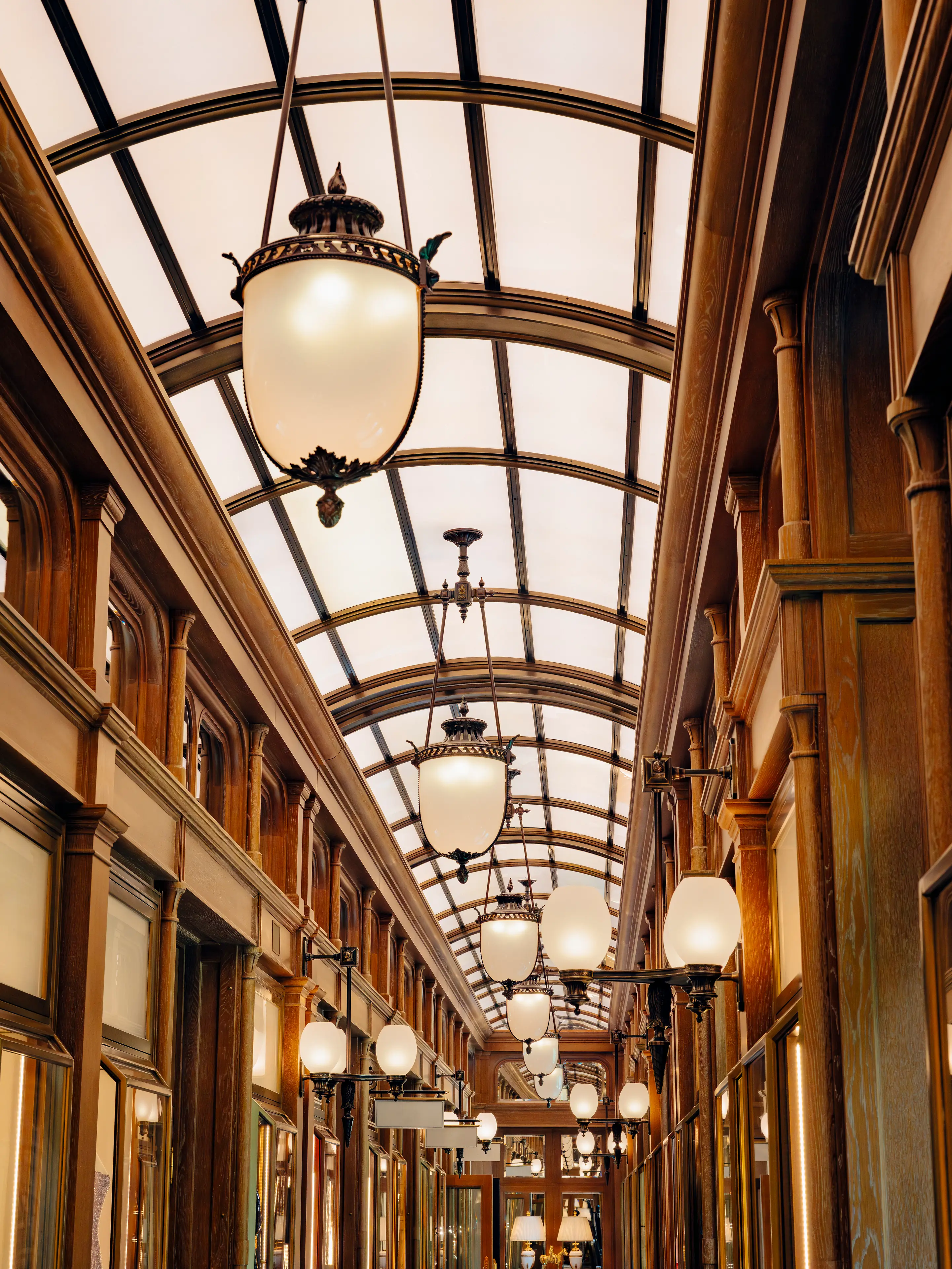 The beautiful Galerie at the Ritz Paris, a shopping arcade under a classic glass roof.