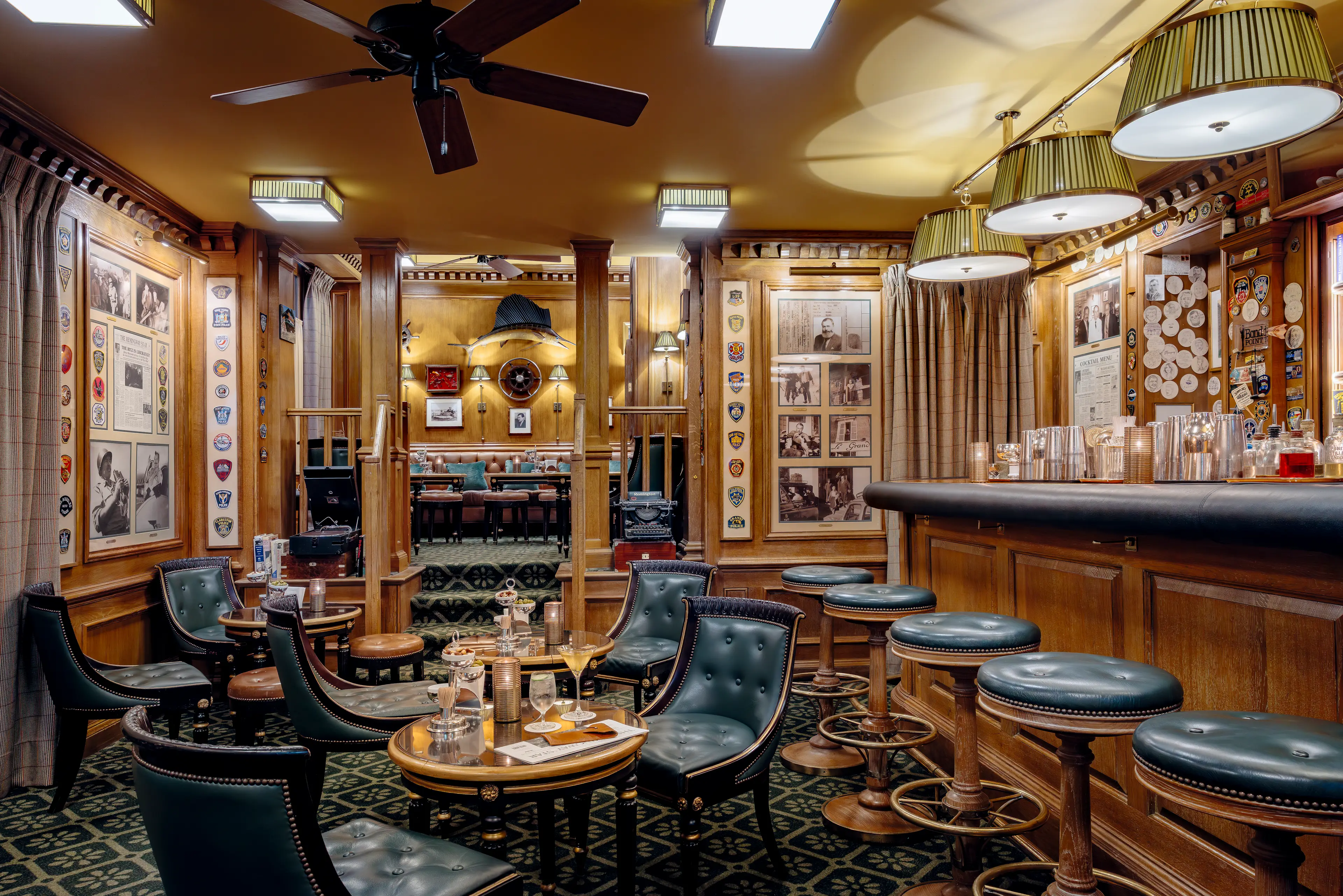 The warm, leather-adorned interior of Bar Hemingway, a timeless Parisian cocktail den.
