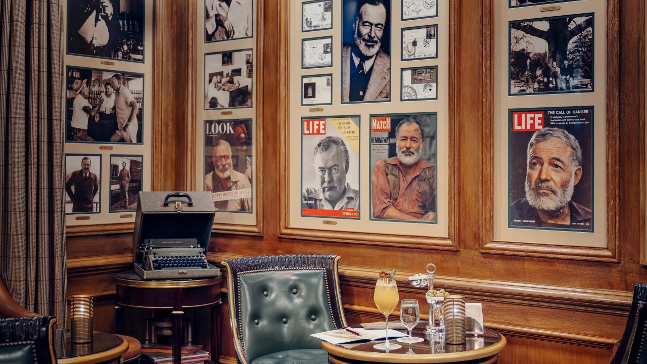 A collection of memorabilia and posters celebrating Ernest Hemingway at his namesake bar.