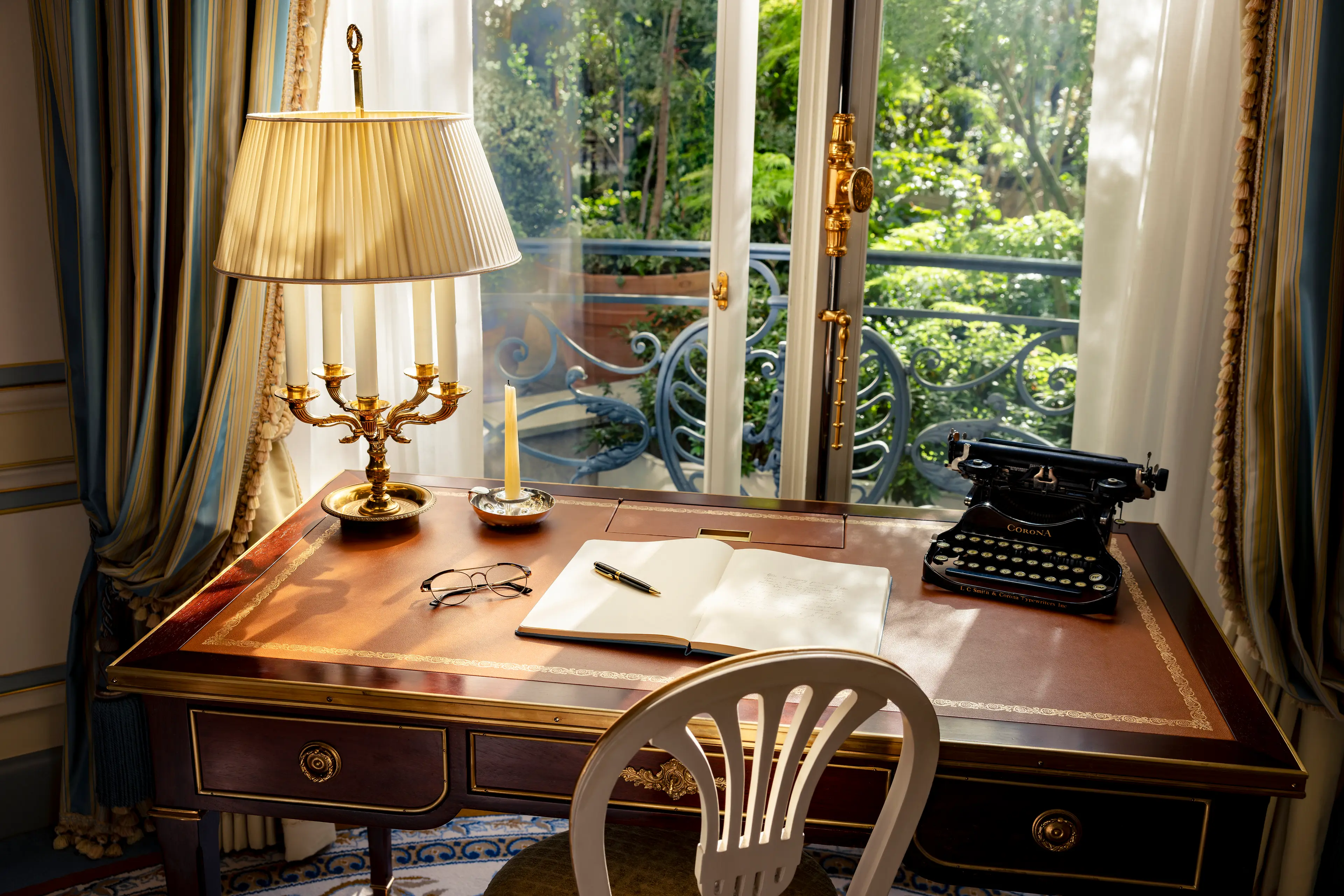 The writer's desk in the Suite Ernest Hemingway, filled with adventurous memorabilia.