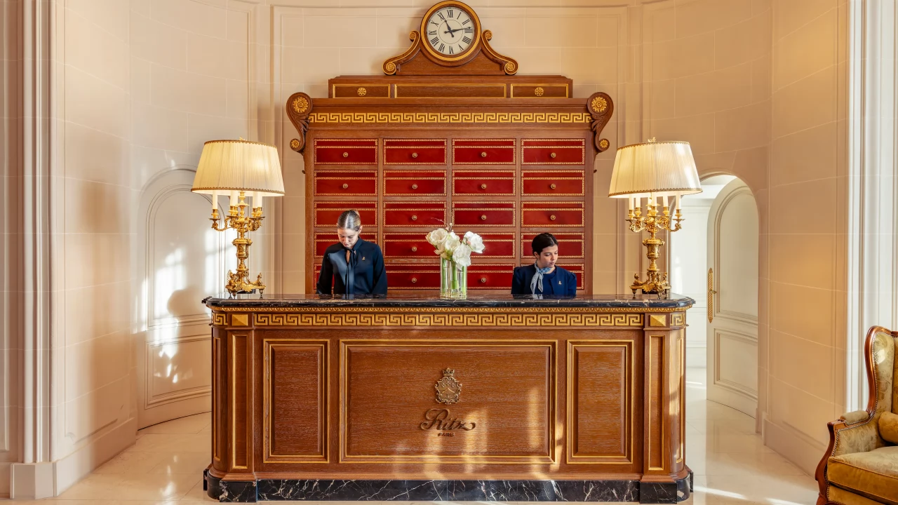 The elegant reception and concierge desk, ready to cater to every guest's need.