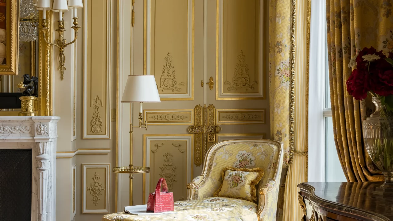 A sumptuous armchair in the Suite Impériale, exemplifying the suite's regal Napoleon III-inspired decor.