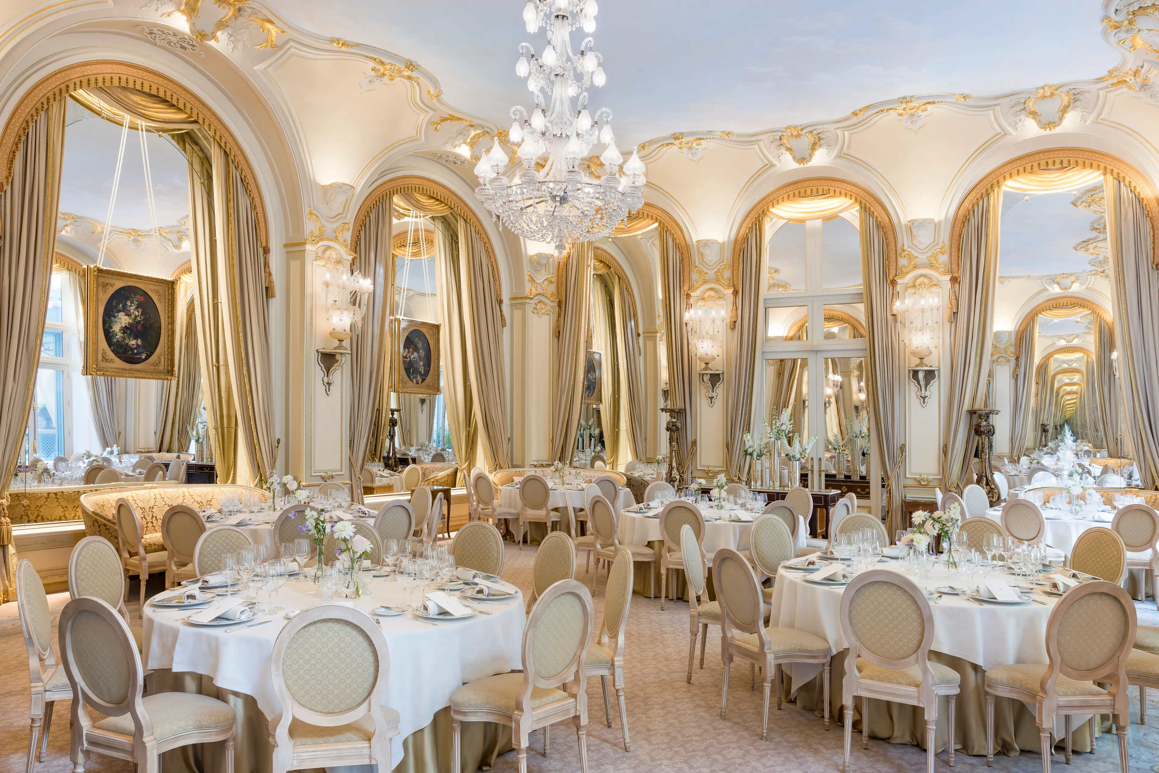 The Salon Marie-Louise, set for an event under its magnificent painted ceiling.