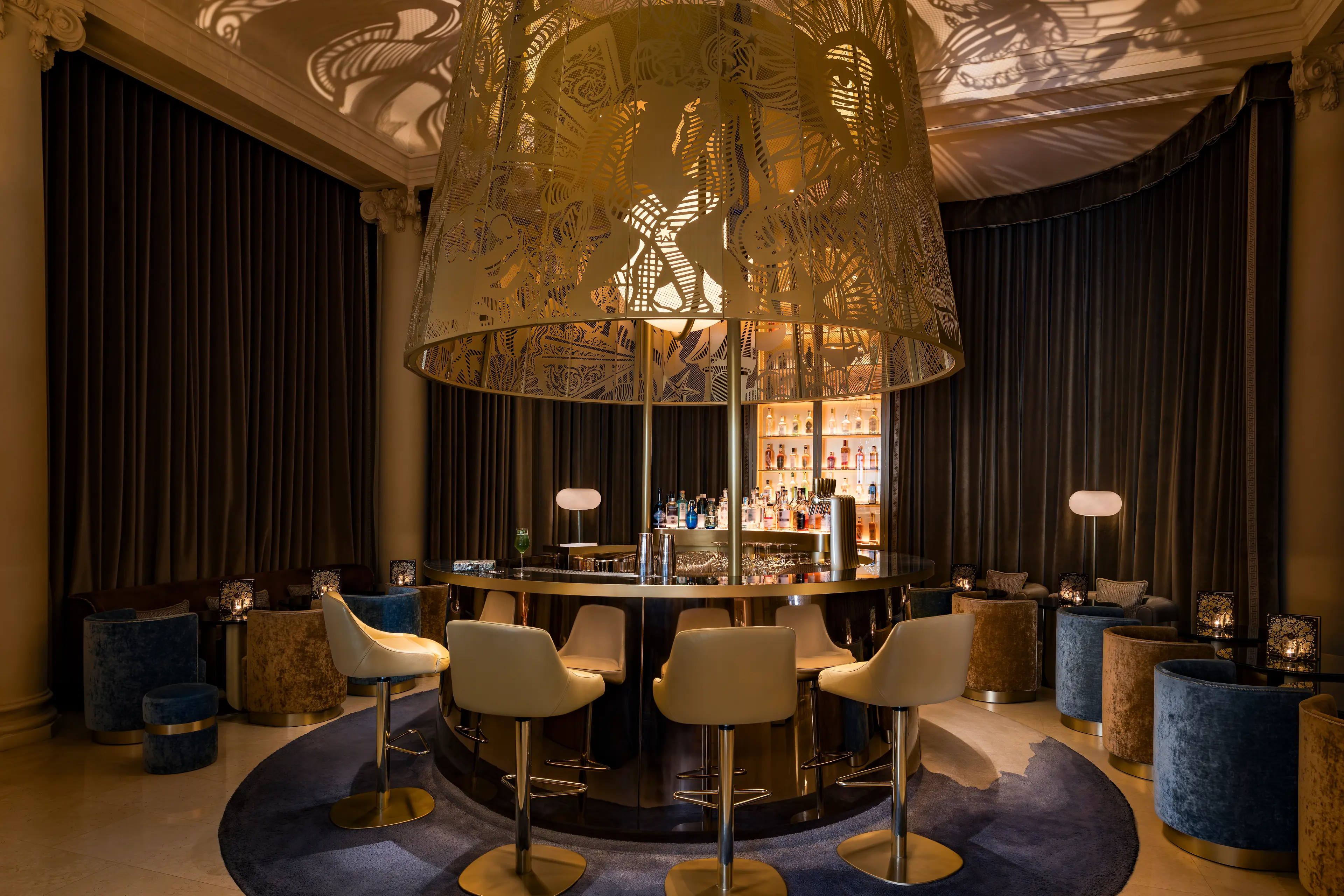 A detailed view of the monumental brass lantern in the Ritz Bar.