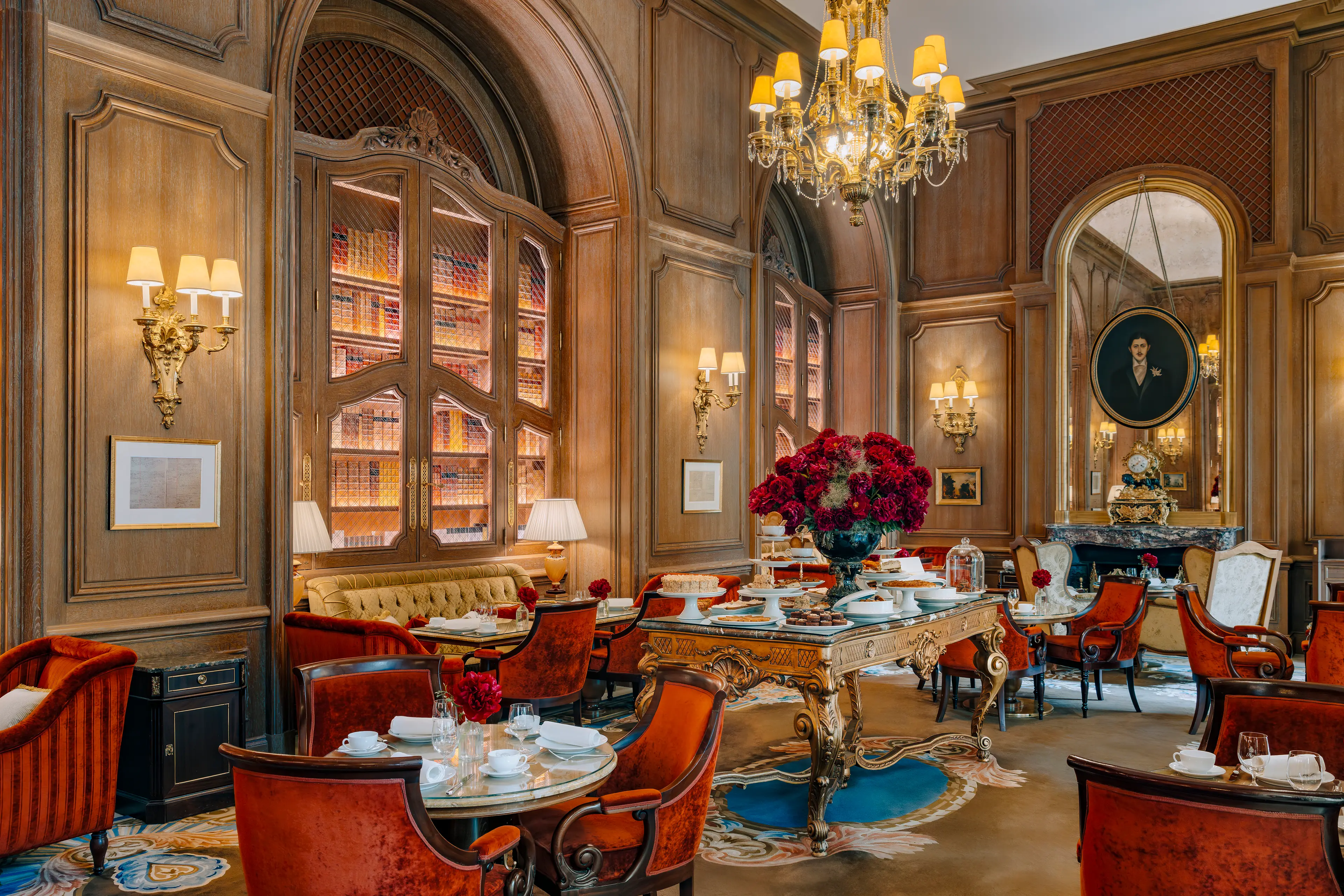 The cozy, wood-paneled interior of Salon Proust, ideal for a classic French tea time.