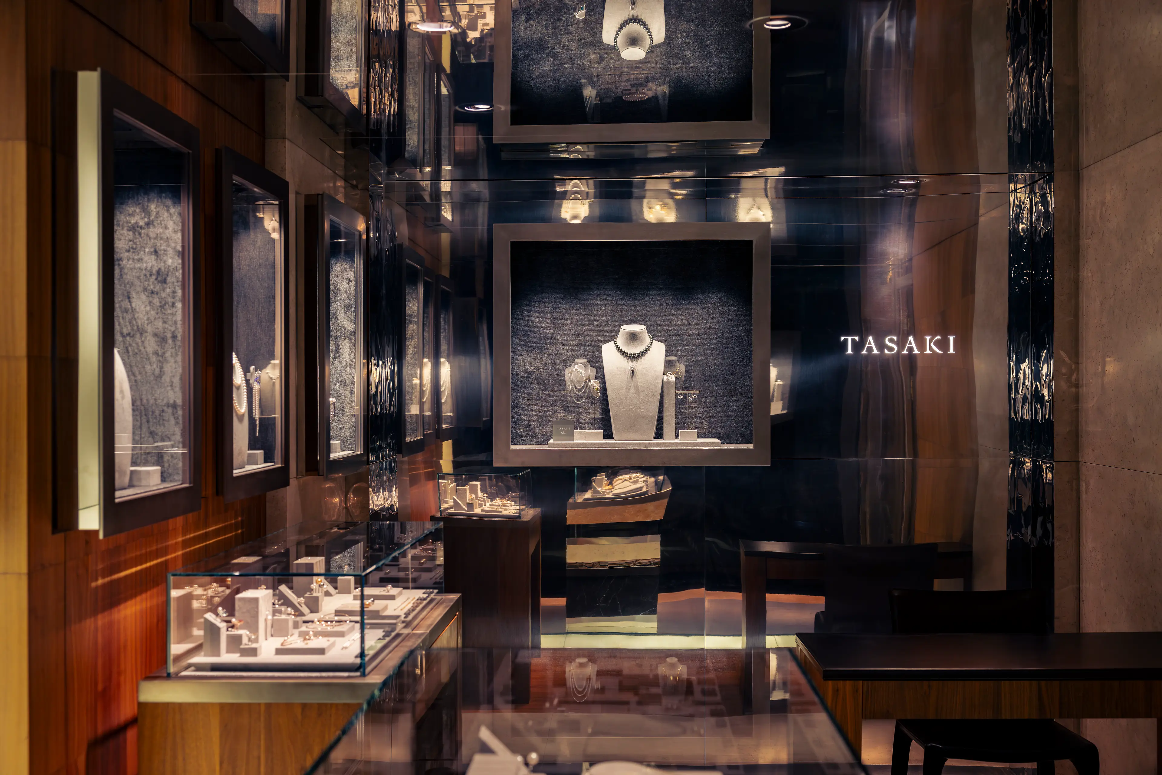 The elegant interior of the Tasaki fine jewelry boutique in the Ritz Paris Galerie.