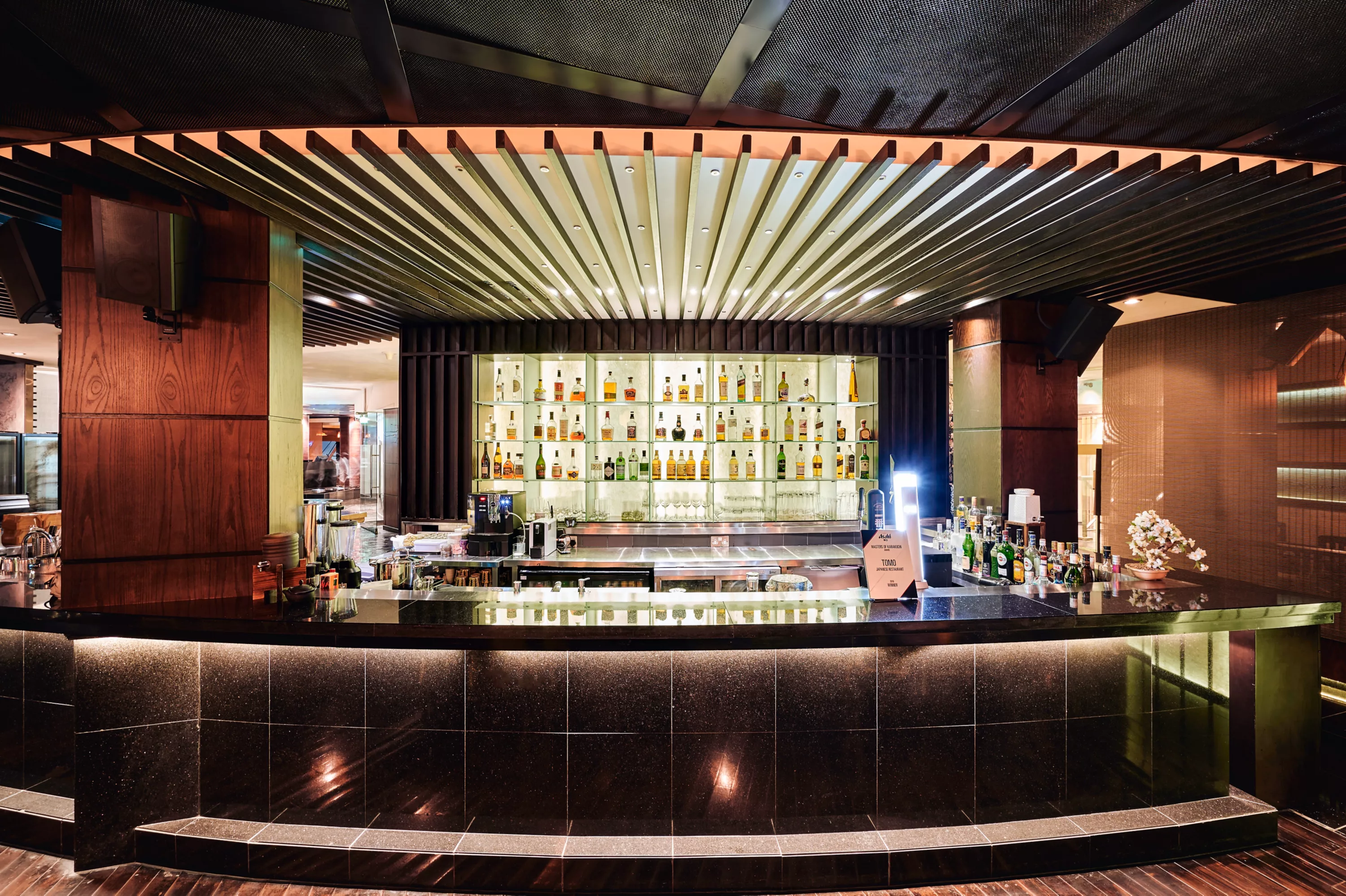 The authentic dining setting of award-winning Japanese restaurant Tomo at Raffles Dubai.