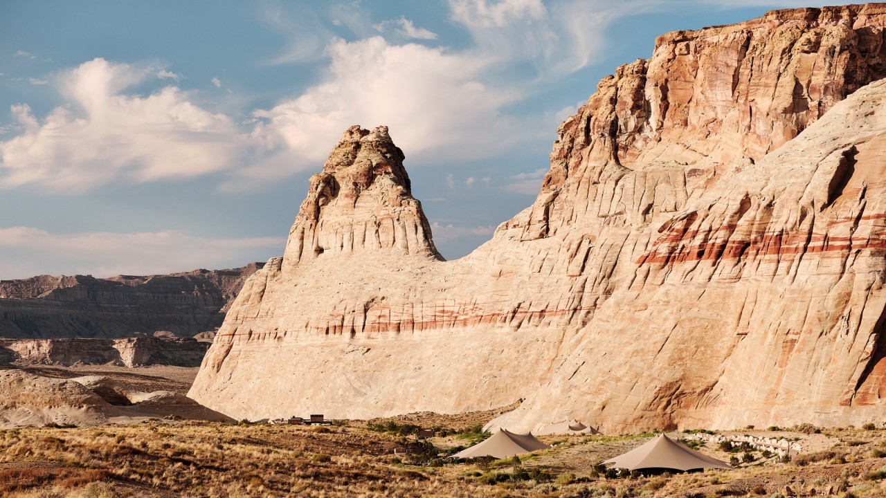 A view of Camp Sarika's luxury tented pavilions nestled at the foot of the desert mesas at Amangiri.