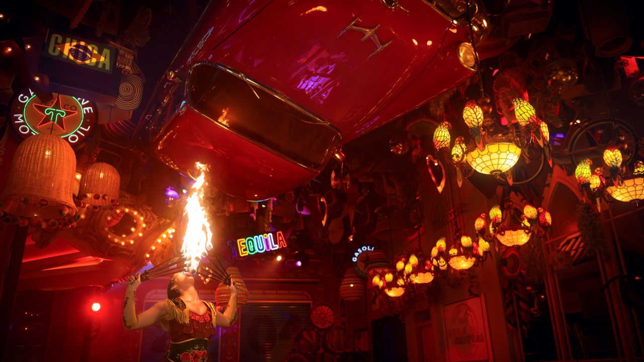 A professional fire breather creates a spectacular burst of flame during a live show at the En Fuego restaurant in Atlantis, The Palm.