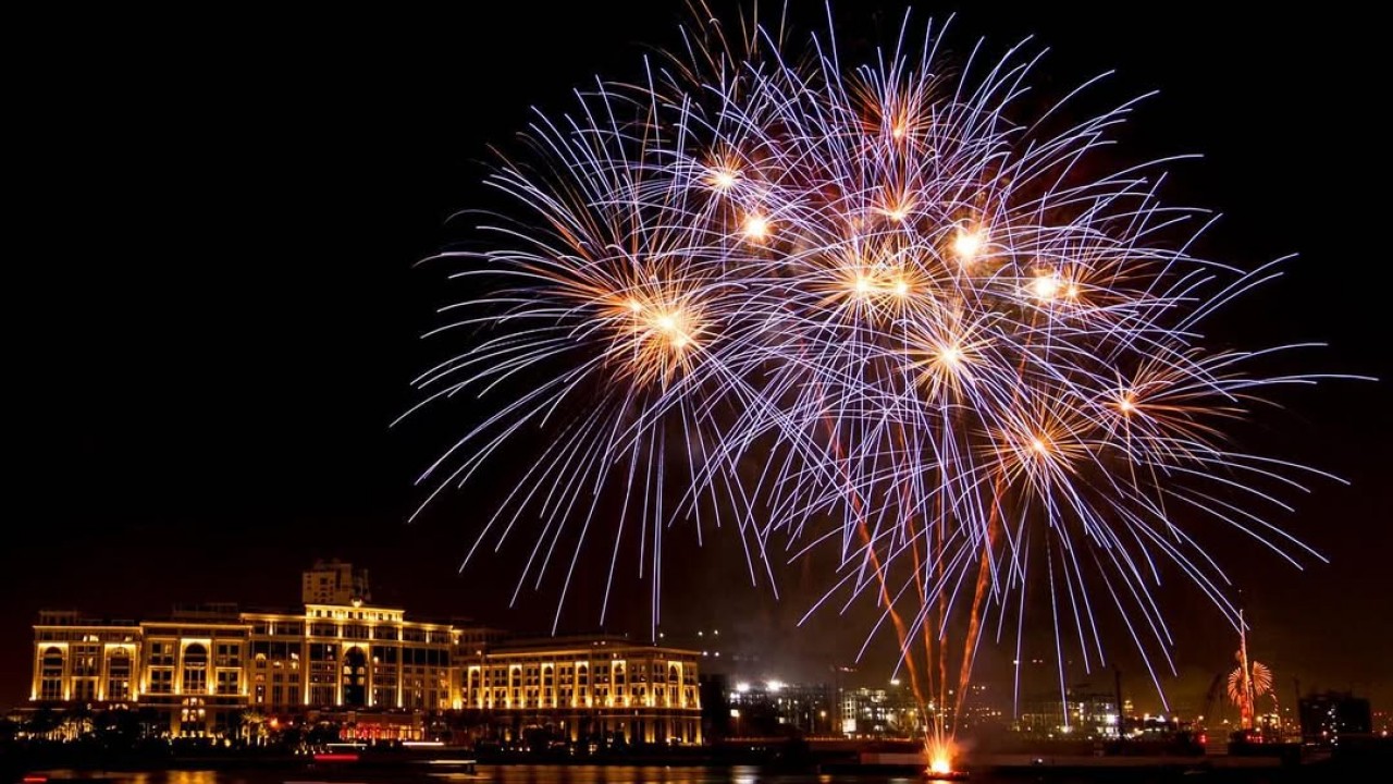 A fireworks display from a previous New Year's Eve celebration at Palazzo Versace Dubai, showcasing the hotel's iconic setting for the upcoming festivities.
